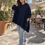 Gebreide poncho met capuchon in legergroen