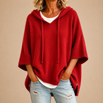 Gebreide poncho met capuchon in zwart