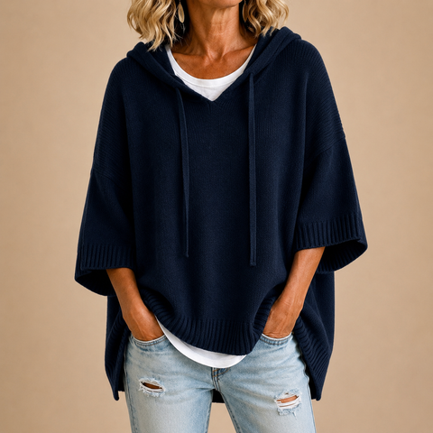 Gebreide poncho met capuchon in wit
