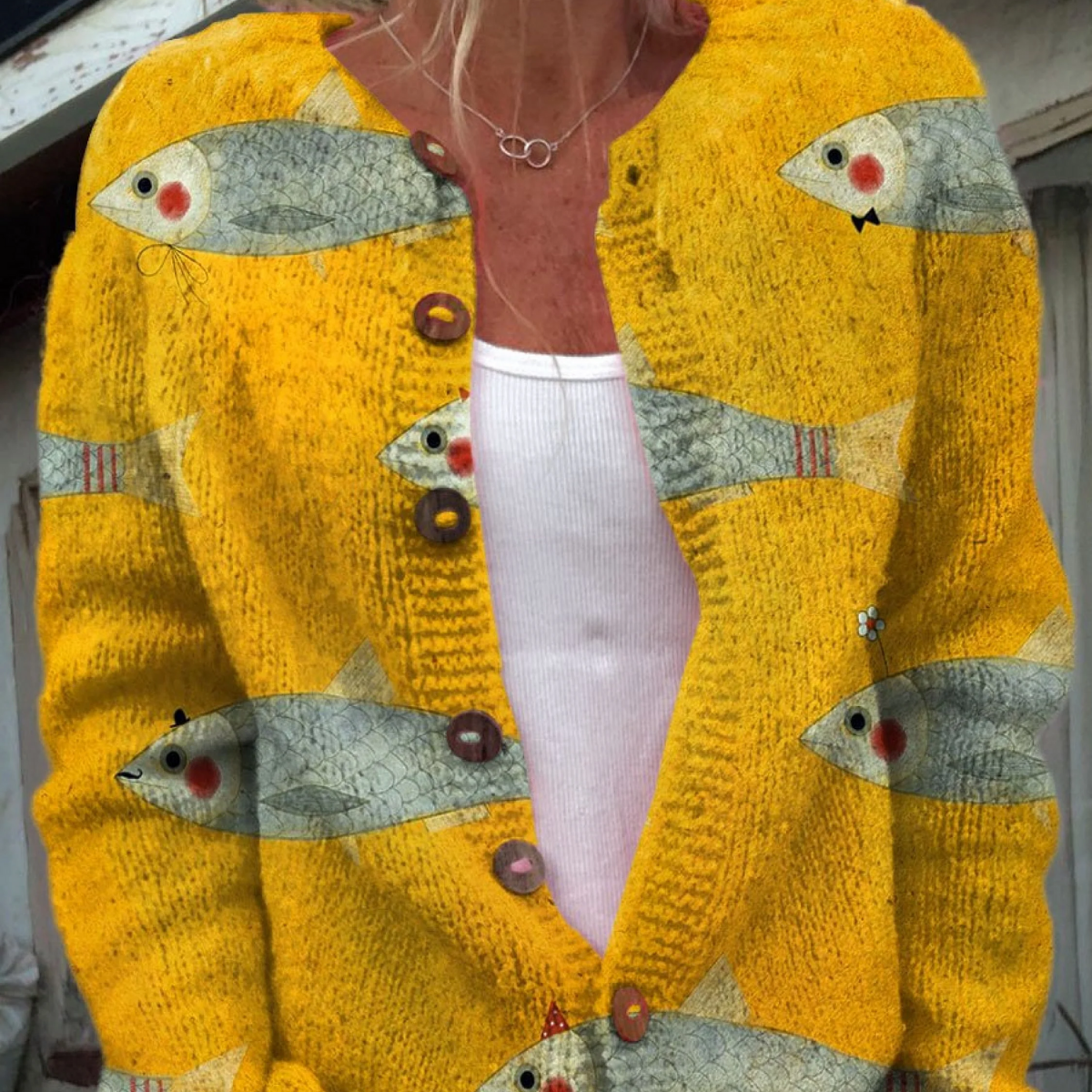 Anke - Geel vest met vismotief