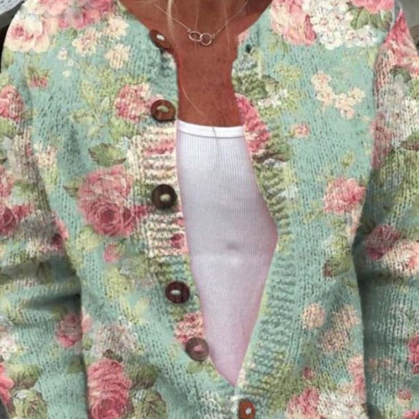 Christa - Saliegroen vest met rozenpatroon