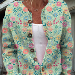 Claudia - Mintgroen vest met kleurrijke bloemen