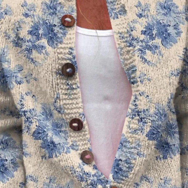 Heike - Crèmekleurig vest met blauwe bloemen