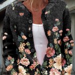 Karin - Zwart vest met bloemenpatroon