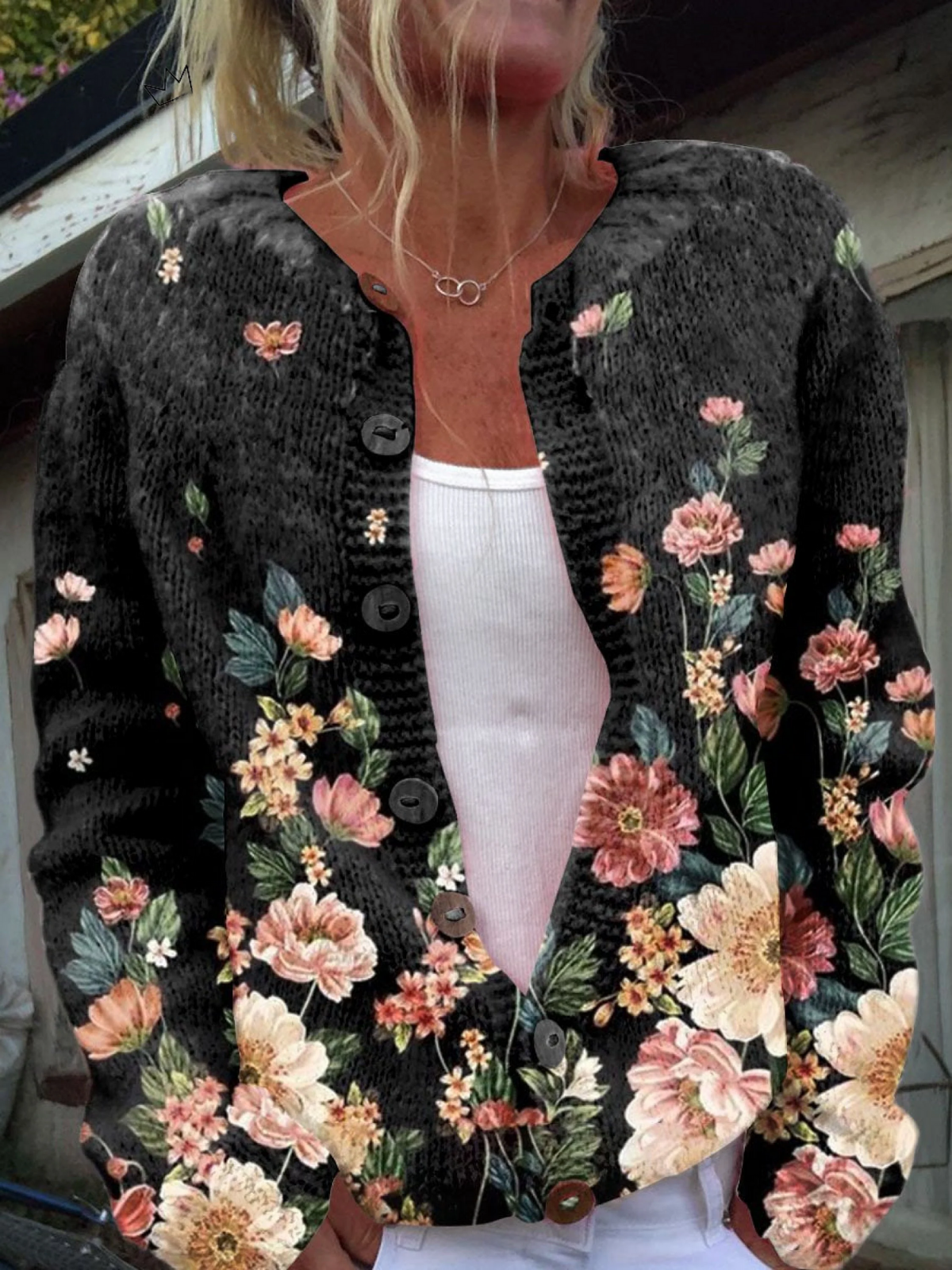 Karin - Zwart vest met bloemenpatroon