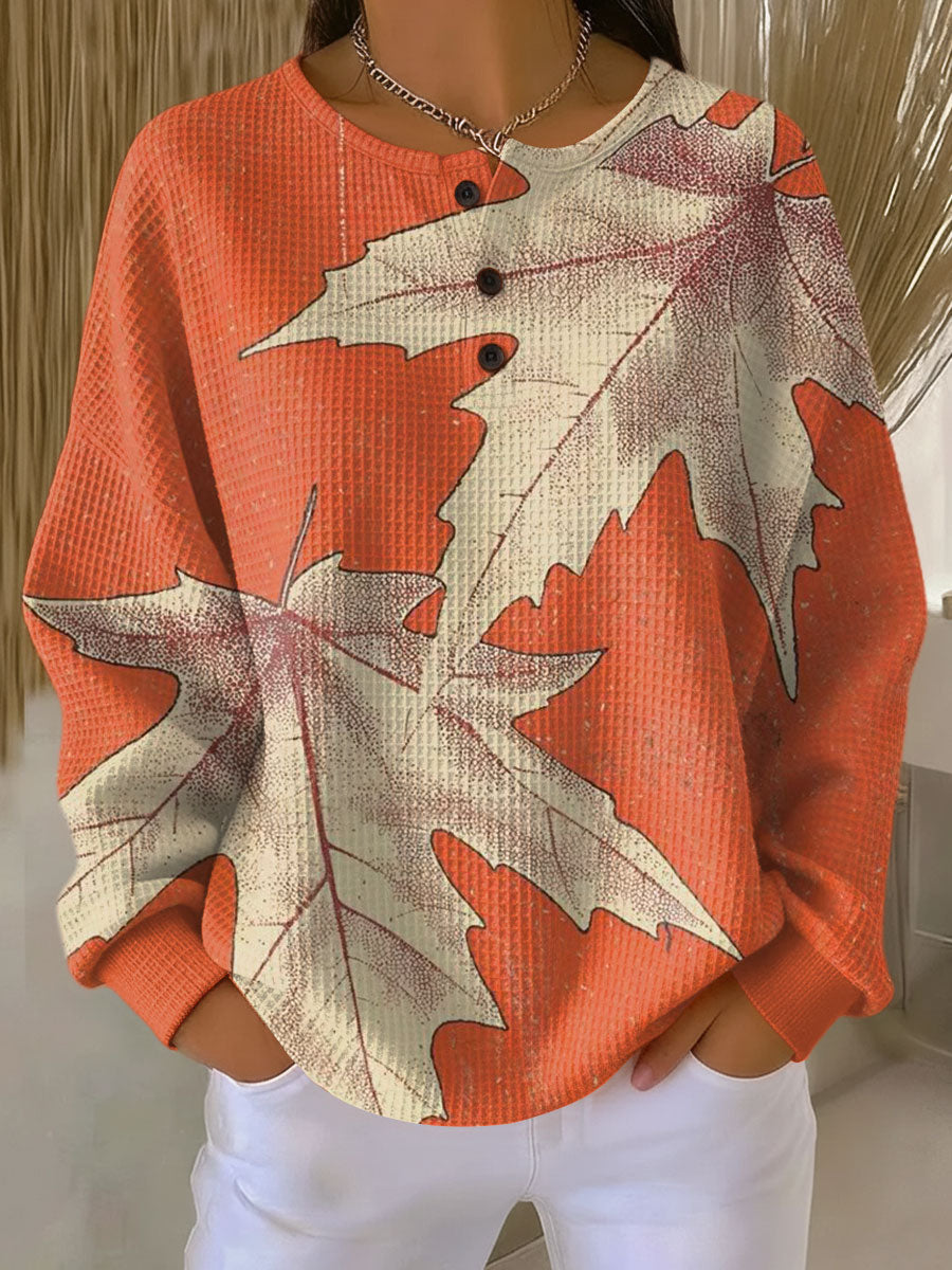 Marit - Trui in oranje met herfstbladeren