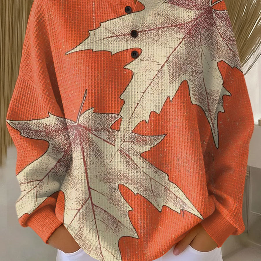 Marit - Trui in oranje met herfstbladeren
