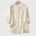 Nellie - Elegante top met geborduurde bloemen