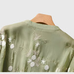 Nellie - Elegante top met geborduurde bloemen