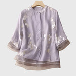 Nellie - Elegante top met geborduurde bloemen