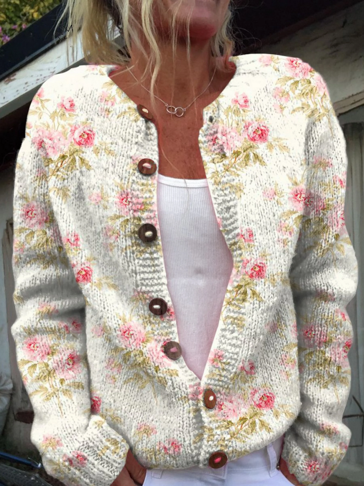 Petra - Crèmekleurig vest met roze bloemen