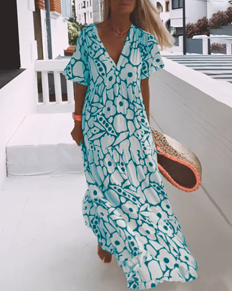 Romy - Losse jurk met V-hals en print