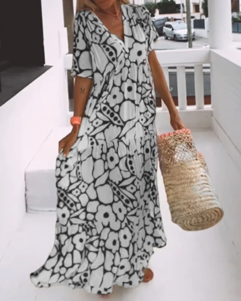Romy - Losse jurk met V-hals en print
