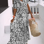 Romy - Losse jurk met V-hals en print
