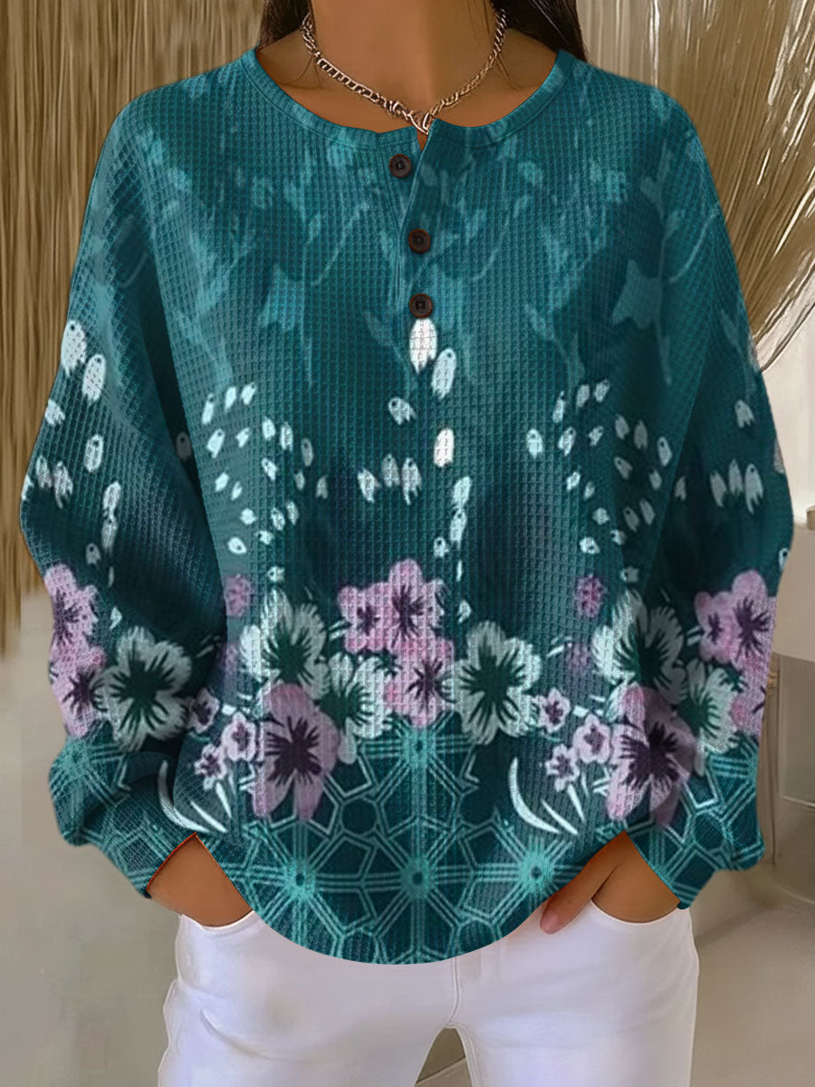 Roos - Trui in turquoise met bloemen