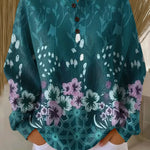 Roos - Trui in turquoise met bloemen