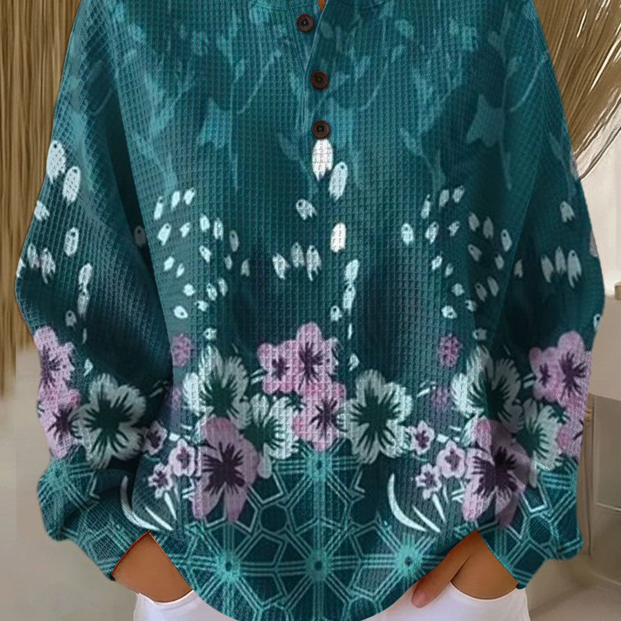 Roos - Trui in turquoise met bloemen