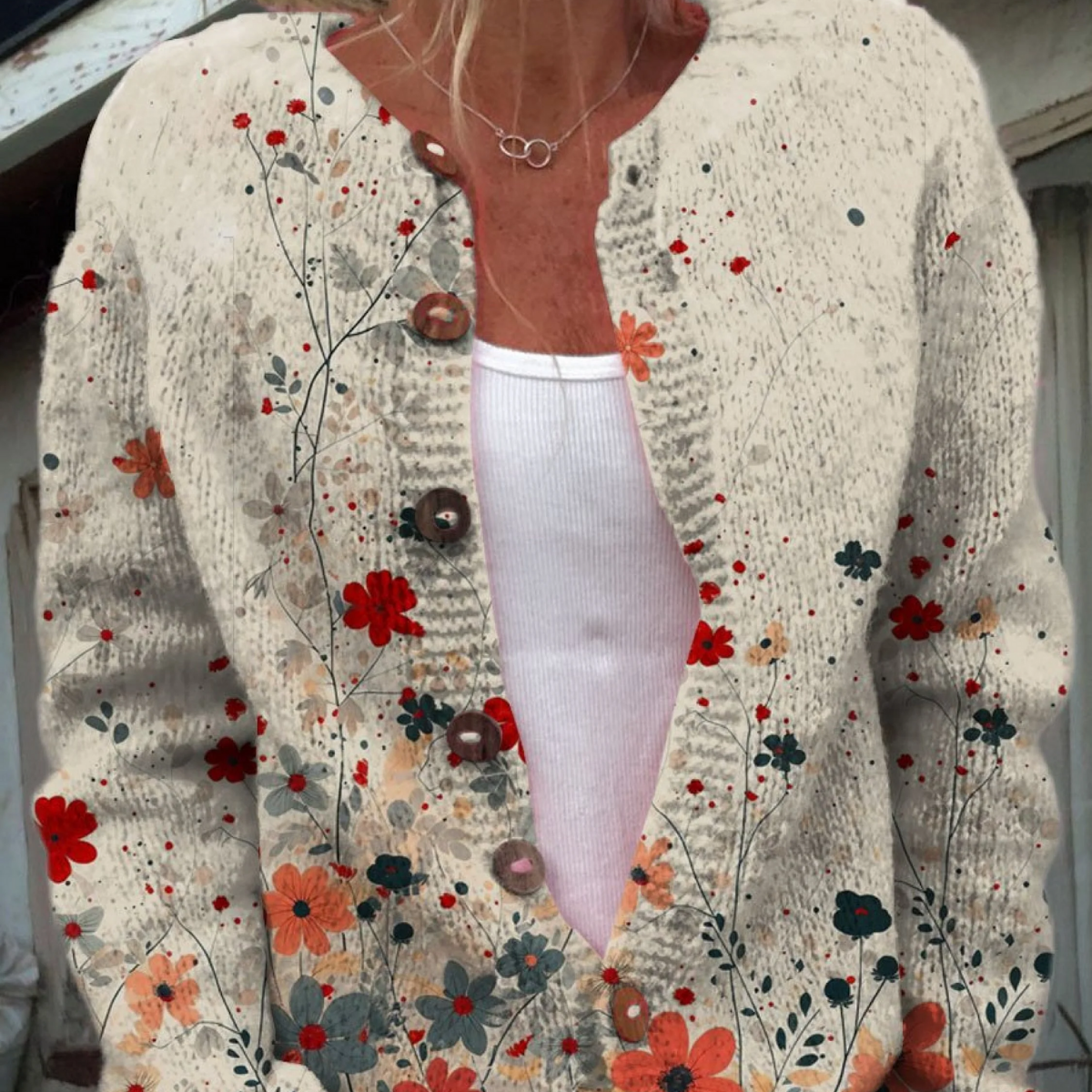Sabrina - Crèmekleurig vest met bloemen