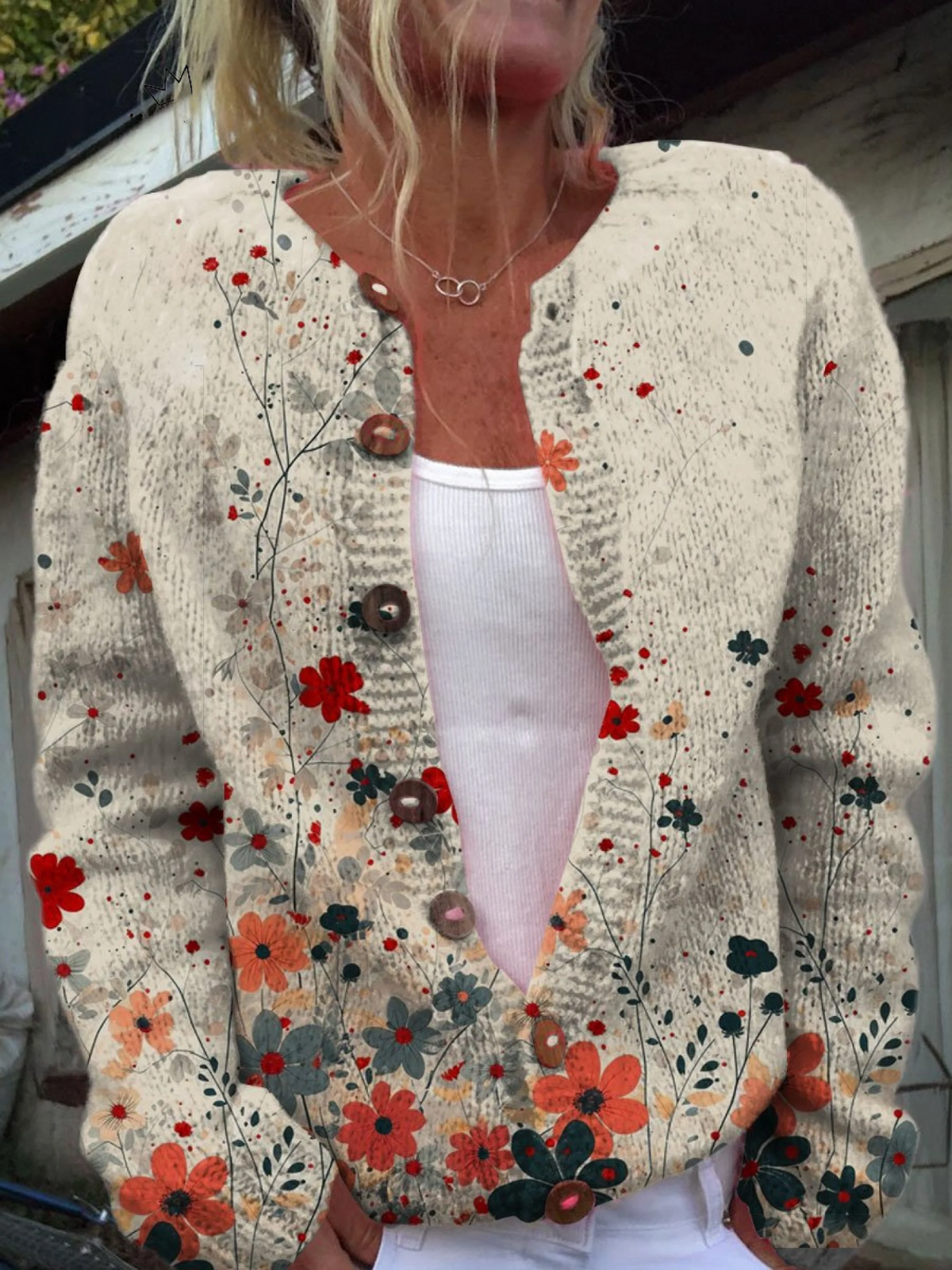 Sabrina - Crèmekleurig vest met bloemen