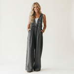 Suzan - Denim jumpsuit met wijde plooipijpen