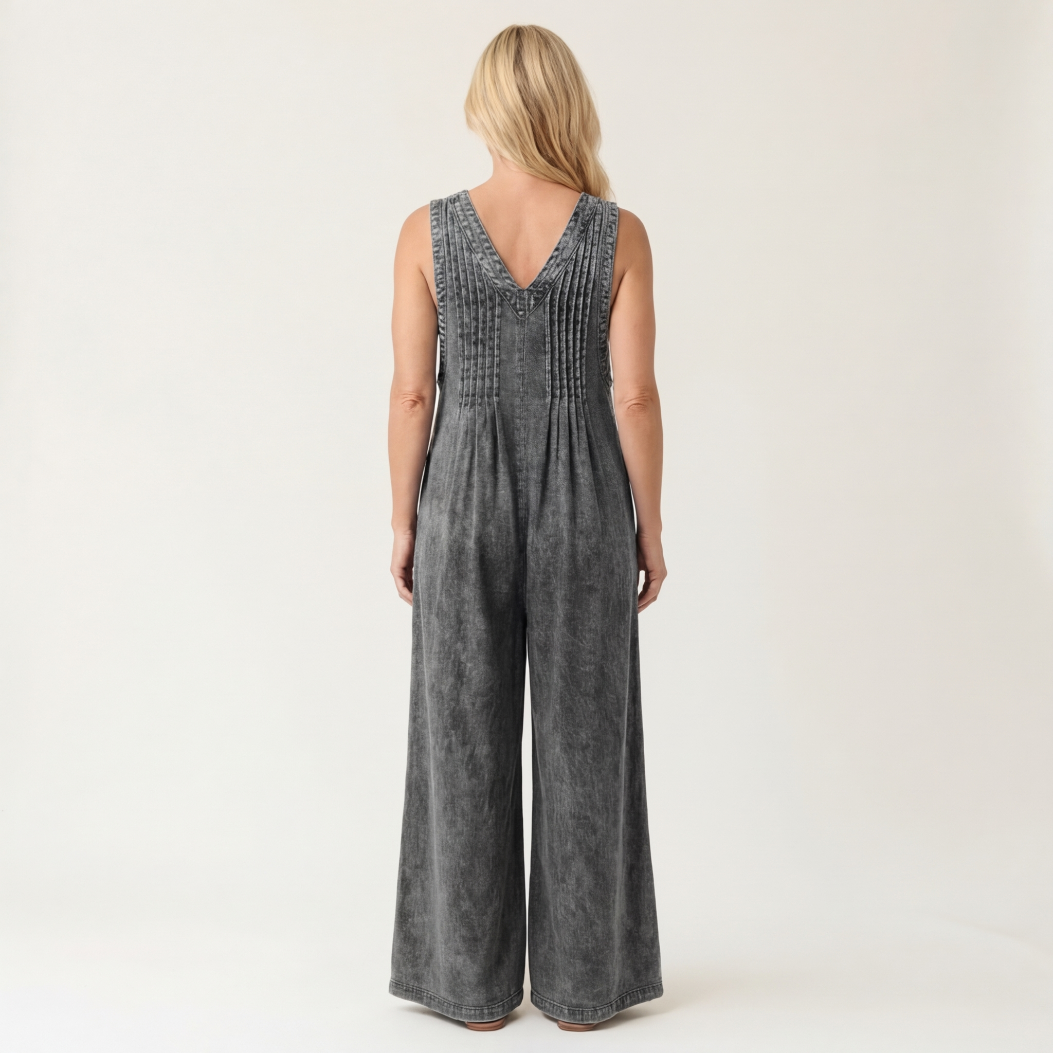 Suzan - Denim jumpsuit met wijde plooipijpen