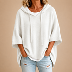 Gebreide poncho met capuchon in wit